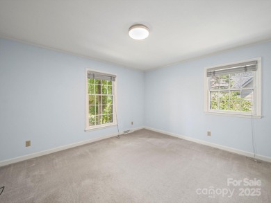 Welcome to this 1970s ranch-style home located in the desirable on Pine Island Country Club in North Carolina - for sale on GolfHomes.com, golf home, golf lot