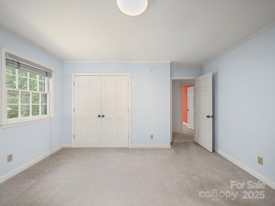 Welcome to this 1970s ranch-style home located in the desirable on Pine Island Country Club in North Carolina - for sale on GolfHomes.com, golf home, golf lot