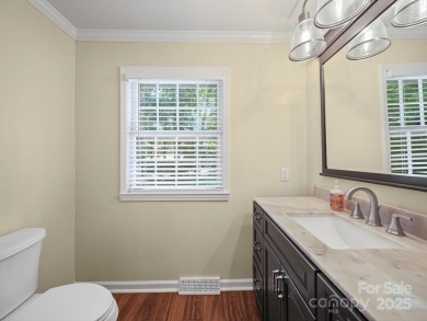 Welcome to this 1970s ranch-style home located in the desirable on Pine Island Country Club in North Carolina - for sale on GolfHomes.com, golf home, golf lot