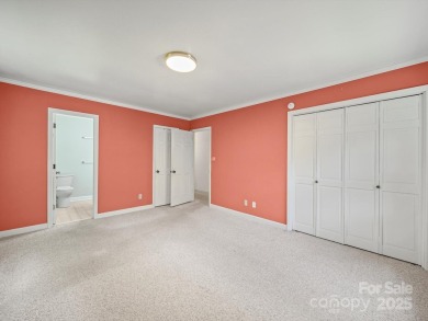 Welcome to this 1970s ranch-style home located in the desirable on Pine Island Country Club in North Carolina - for sale on GolfHomes.com, golf home, golf lot