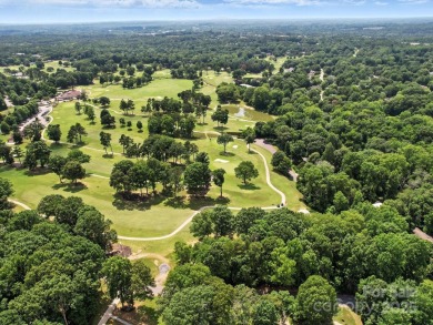 Welcome to this 1970s ranch-style home located in the desirable on Pine Island Country Club in North Carolina - for sale on GolfHomes.com, golf home, golf lot