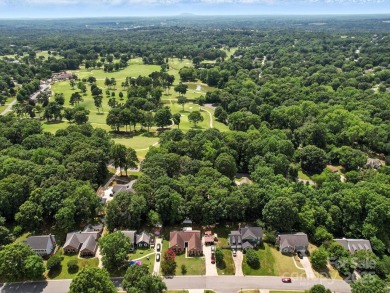 Welcome to this 1970s ranch-style home located in the desirable on Pine Island Country Club in North Carolina - for sale on GolfHomes.com, golf home, golf lot