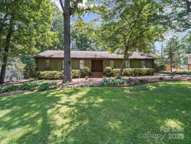 Welcome to this 1970s ranch-style home located in the desirable on Pine Island Country Club in North Carolina - for sale on GolfHomes.com, golf home, golf lot