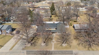 Located in Riverside neighborhood close to elementary, middle on Riverside Country Club in Nebraska - for sale on GolfHomes.com, golf home, golf lot