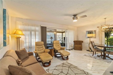 Winding tree-lined roads lead to Sea Grape Villas, where this on Bird Bay Executive Golf Club in Florida - for sale on GolfHomes.com, golf home, golf lot