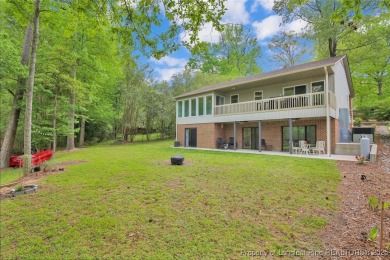 Appraised for $615k. This deceptively large lake front home has on Carolina Trace Country Club in North Carolina - for sale on GolfHomes.com, golf home, golf lot
