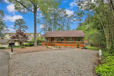 Appraised for $615k. This deceptively large lake front home has on Carolina Trace Country Club in North Carolina - for sale on GolfHomes.com, golf home, golf lot