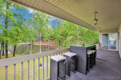Appraised for $615k. This deceptively large lake front home has on Carolina Trace Country Club in North Carolina - for sale on GolfHomes.com, golf home, golf lot