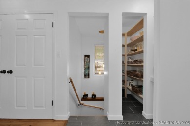 Appraised for $615k. This deceptively large lake front home has on Carolina Trace Country Club in North Carolina - for sale on GolfHomes.com, golf home, golf lot