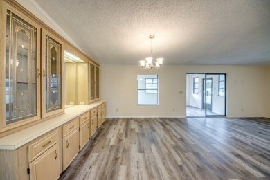 Discover the beauty of Pine Lakes Country Club with this on Pine Lakes Country Club in Florida - for sale on GolfHomes.com, golf home, golf lot