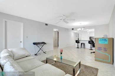 Rare 3BR/2BA corner unit in Deer Creek Country Club with in-unit on Deer Creek Golf Club in Florida - for sale on GolfHomes.com, golf home, golf lot