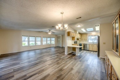 Discover the beauty of Pine Lakes Country Club with this on Pine Lakes Country Club in Florida - for sale on GolfHomes.com, golf home, golf lot