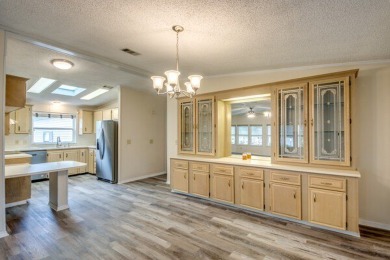 Discover the beauty of Pine Lakes Country Club with this on Pine Lakes Country Club in Florida - for sale on GolfHomes.com, golf home, golf lot