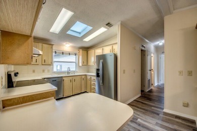 Discover the beauty of Pine Lakes Country Club with this on Pine Lakes Country Club in Florida - for sale on GolfHomes.com, golf home, golf lot