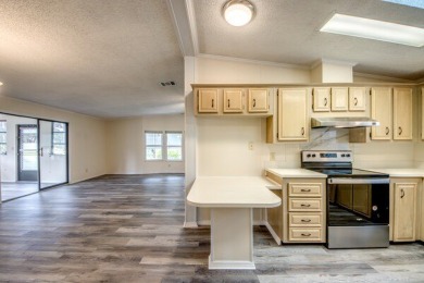 Discover the beauty of Pine Lakes Country Club with this on Pine Lakes Country Club in Florida - for sale on GolfHomes.com, golf home, golf lot