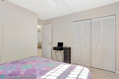 Rare 3BR/2BA corner unit in Deer Creek Country Club with in-unit on Deer Creek Golf Club in Florida - for sale on GolfHomes.com, golf home, golf lot