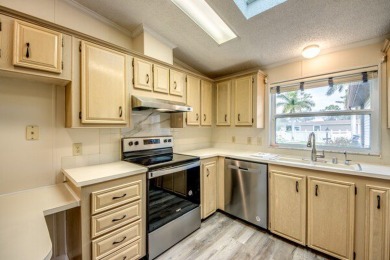 Discover the beauty of Pine Lakes Country Club with this on Pine Lakes Country Club in Florida - for sale on GolfHomes.com, golf home, golf lot