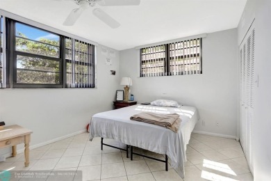 Rare 3BR/2BA corner unit in Deer Creek Country Club with in-unit on Deer Creek Golf Club in Florida - for sale on GolfHomes.com, golf home, golf lot