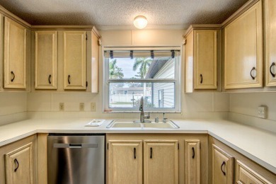 Discover the beauty of Pine Lakes Country Club with this on Pine Lakes Country Club in Florida - for sale on GolfHomes.com, golf home, golf lot