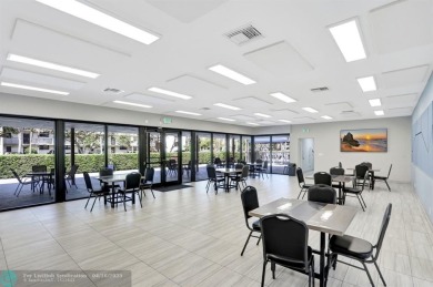 Rare 3BR/2BA corner unit in Deer Creek Country Club with in-unit on Deer Creek Golf Club in Florida - for sale on GolfHomes.com, golf home, golf lot