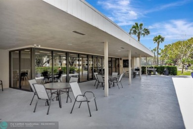 Rare 3BR/2BA corner unit in Deer Creek Country Club with in-unit on Deer Creek Golf Club in Florida - for sale on GolfHomes.com, golf home, golf lot