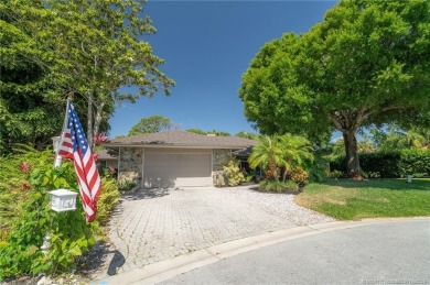 Welcome to your private oasis in Country Club Estates! Tucked on St. Lucie Trail Golf Club in Florida - for sale on GolfHomes.com, golf home, golf lot
