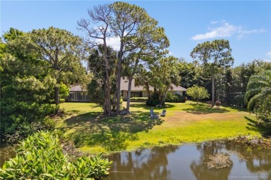 Welcome to your private oasis in Country Club Estates! Tucked on St. Lucie Trail Golf Club in Florida - for sale on GolfHomes.com, golf home, golf lot