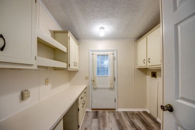 Discover the beauty of Pine Lakes Country Club with this on Pine Lakes Country Club in Florida - for sale on GolfHomes.com, golf home, golf lot