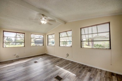 Discover the beauty of Pine Lakes Country Club with this on Pine Lakes Country Club in Florida - for sale on GolfHomes.com, golf home, golf lot