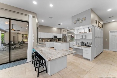 Welcome to your private oasis in Country Club Estates! Tucked on St. Lucie Trail Golf Club in Florida - for sale on GolfHomes.com, golf home, golf lot
