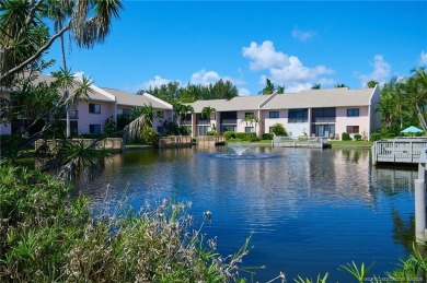 This first-floor, corner condo in Beachtree I within Ocean on Ocean Village Golf Course in Florida - for sale on GolfHomes.com, golf home, golf lot