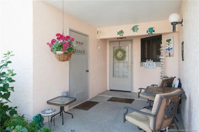 This first-floor, corner condo in Beachtree I within Ocean on Ocean Village Golf Course in Florida - for sale on GolfHomes.com, golf home, golf lot