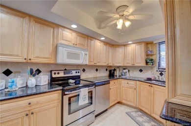 This first-floor, corner condo in Beachtree I within Ocean on Ocean Village Golf Course in Florida - for sale on GolfHomes.com, golf home, golf lot