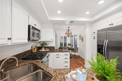 Bright and airy, this beautifully remodeled condominium exudes a on Mission Viejo Country Club in California - for sale on GolfHomes.com, golf home, golf lot