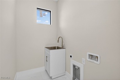 Brand-new construction, this 4-bed, 2-bath residence with a on River Hall Country Club in Florida - for sale on GolfHomes.com, golf home, golf lot