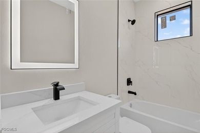 Brand-new construction, this 4-bed, 2-bath residence with a on River Hall Country Club in Florida - for sale on GolfHomes.com, golf home, golf lot