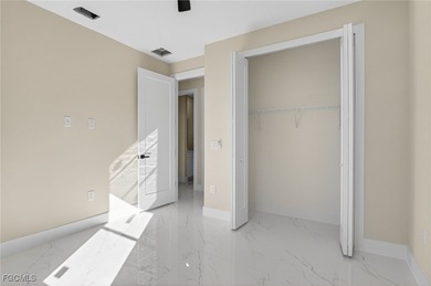 Brand-new construction, this 4-bed, 2-bath residence with a on River Hall Country Club in Florida - for sale on GolfHomes.com, golf home, golf lot