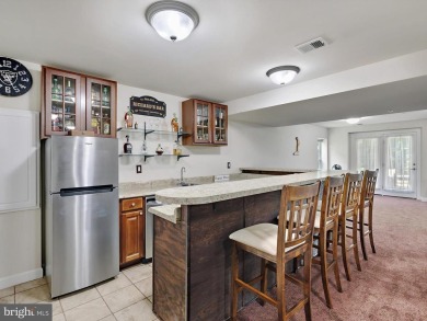 Welcome to 15446 Symondsbury Way - a stunning 4-bedroom, 3 on Lake Presidential Golf Club in Maryland - for sale on GolfHomes.com, golf home, golf lot
