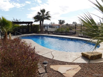 What a spectacular pool home, Open Floor plan that features a on Desert Lakes Golf Course in Arizona - for sale on GolfHomes.com, golf home, golf lot