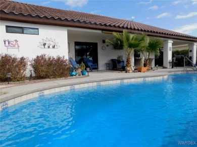 What a spectacular pool home, Open Floor plan that features a on Desert Lakes Golf Course in Arizona - for sale on GolfHomes.com, golf home, golf lot