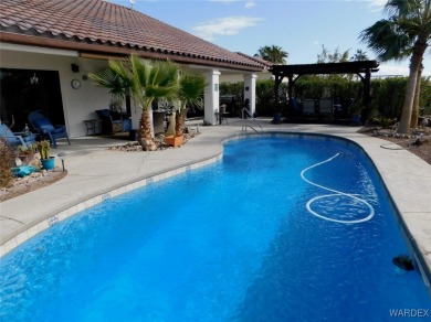 What a spectacular pool home, Open Floor plan that features a on Desert Lakes Golf Course in Arizona - for sale on GolfHomes.com, golf home, golf lot