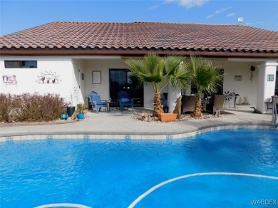 What a spectacular pool home, Open Floor plan that features a on Desert Lakes Golf Course in Arizona - for sale on GolfHomes.com, golf home, golf lot