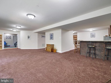 Welcome to 15446 Symondsbury Way - a stunning 4-bedroom, 3 on Lake Presidential Golf Club in Maryland - for sale on GolfHomes.com, golf home, golf lot