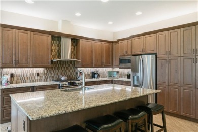 Step into pure perfection at Hampton Model Villa in the highly on Palmira Golf and Country Club in Florida - for sale on GolfHomes.com, golf home, golf lot