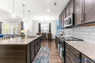 Welcome to MAGNOLIA GREEN! This STUNNING END UNIT townhome on The Westham Golf Club At Magnolia Green in Virginia - for sale on GolfHomes.com, golf home, golf lot