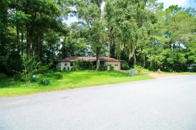 Discover your dream home in the serene Rainbow Springs Country on Rainbow Springs Golf and Country Club in Florida - for sale on GolfHomes.com, golf home, golf lot