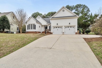 This beautifully updated 5-bedroom, 3-bathroom home offers a on The Neuse Golf Club in North Carolina - for sale on GolfHomes.com, golf home, golf lot
