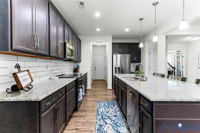 Welcome to MAGNOLIA GREEN! This STUNNING END UNIT townhome on The Westham Golf Club At Magnolia Green in Virginia - for sale on GolfHomes.com, golf home, golf lot