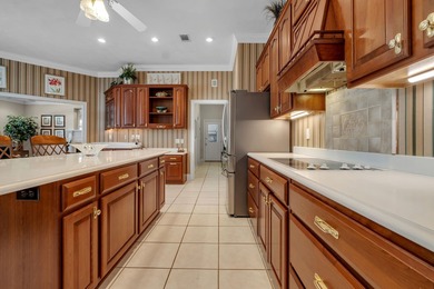 Elegant Lakefront Living in Prestigious Golden Eagle Plantation on Golden Eagle Country Club in Florida - for sale on GolfHomes.com, golf home, golf lot