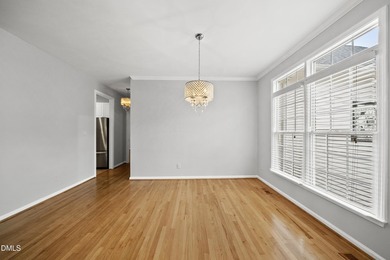 This beautifully updated 5-bedroom, 3-bathroom home offers a on The Neuse Golf Club in North Carolina - for sale on GolfHomes.com, golf home, golf lot